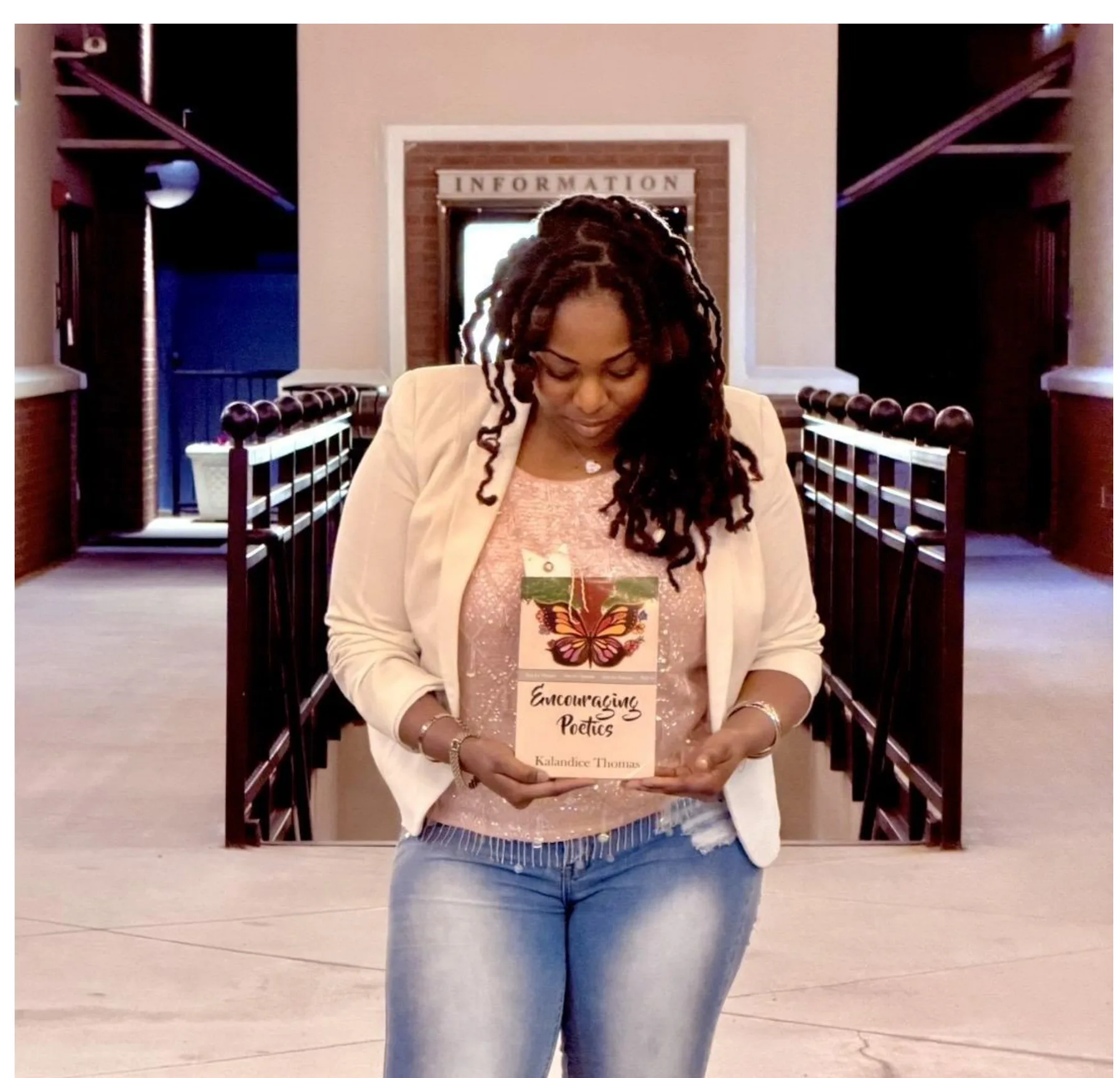 Kalandice Thomas holding Encouraging Poetics